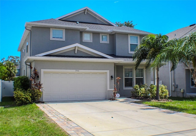 view of front of home with a garage