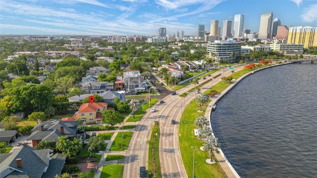 drone / aerial view with a view of city and a water view