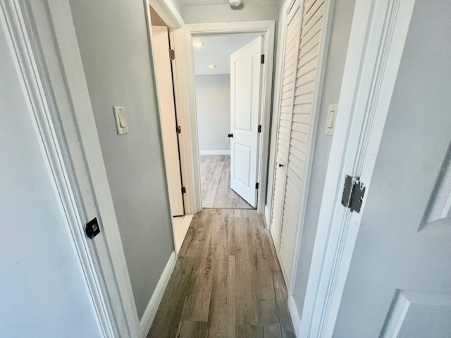 corridor featuring light wood-type flooring