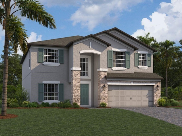 view of front of house featuring a front yard and a garage