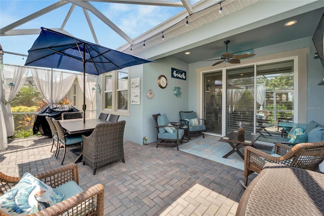 view of patio / terrace featuring an outdoor hangout area, a lanai, and ceiling fan