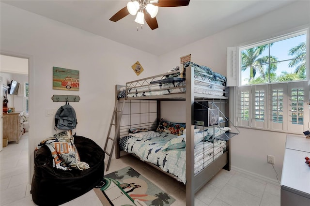 bedroom featuring ceiling fan