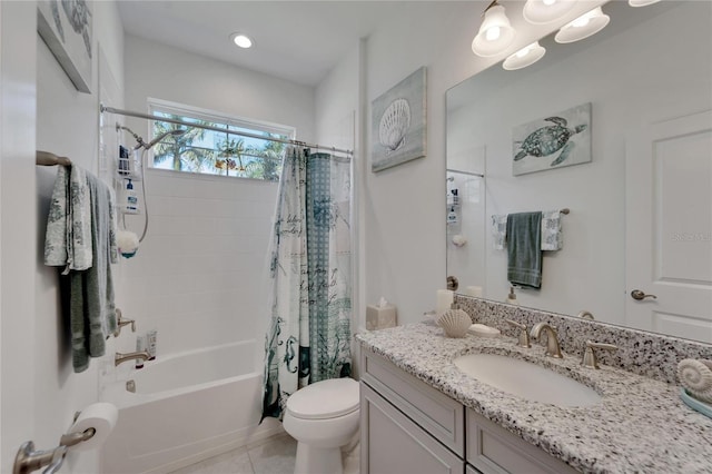 full bathroom featuring toilet, tile patterned flooring, shower / bath combo, and vanity