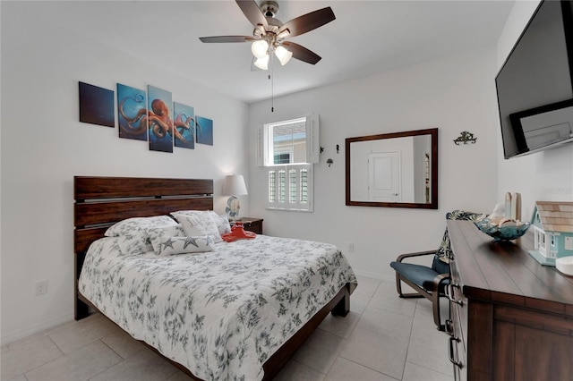 tiled bedroom with ceiling fan