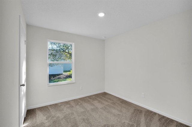 view of carpeted spare room