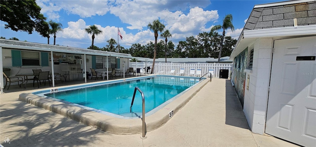 view of pool with a patio area