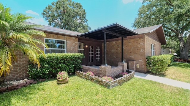 exterior space featuring a front yard