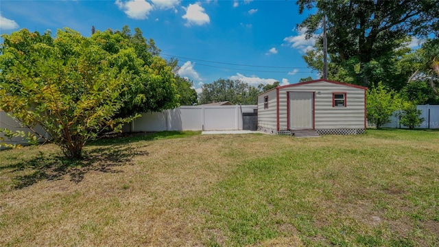 view of yard featuring a storage unit