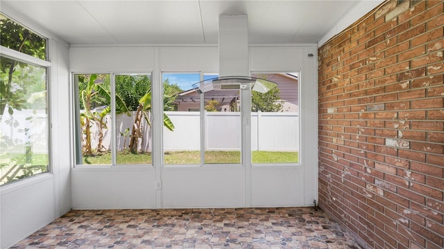 view of unfurnished sunroom