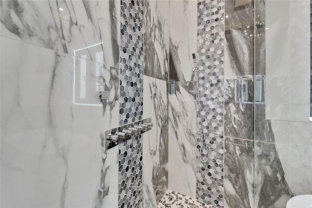 details featuring tiled shower