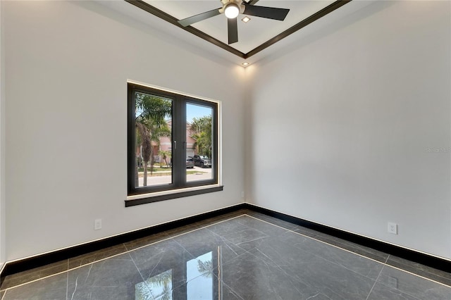 empty room featuring vaulted ceiling, ceiling fan, and crown molding