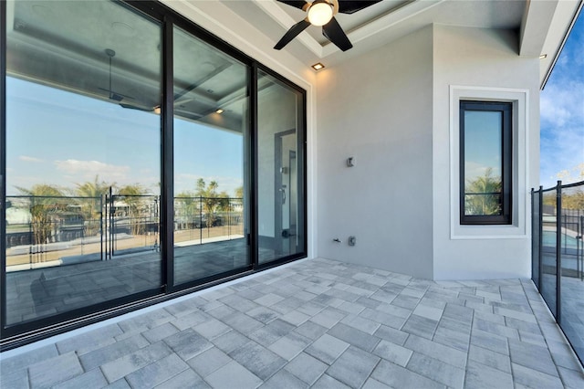 view of patio / terrace featuring ceiling fan