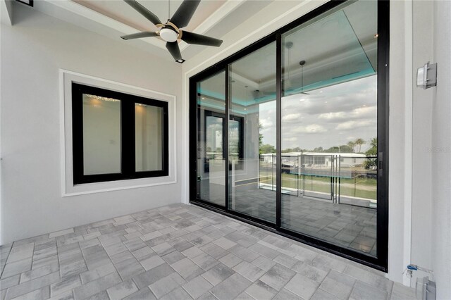 view of patio with ceiling fan