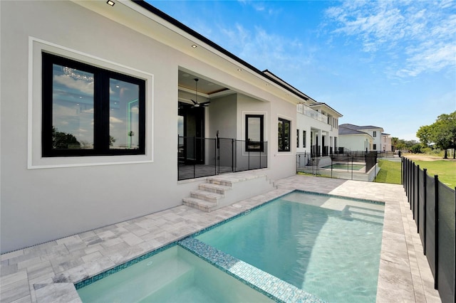 view of swimming pool with a fenced in pool, a patio area, and fence