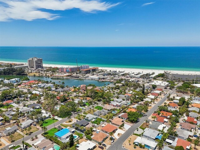 aerial view with a view of the beach and a water view