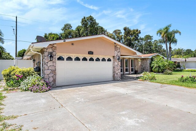 ranch-style home with a garage