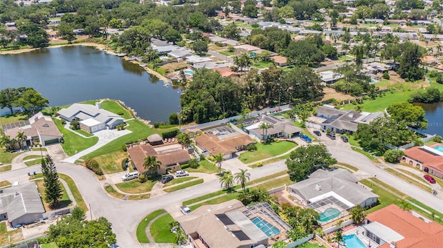 drone / aerial view with a water view