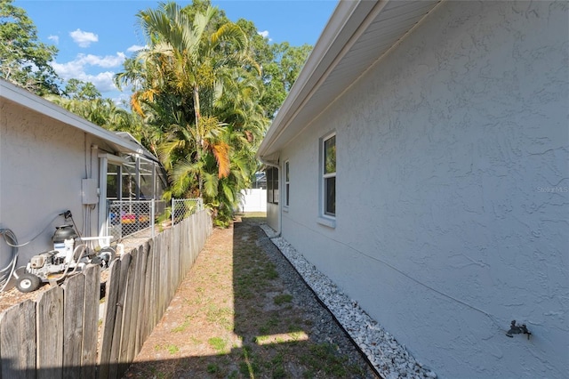 view of home's exterior featuring a lanai