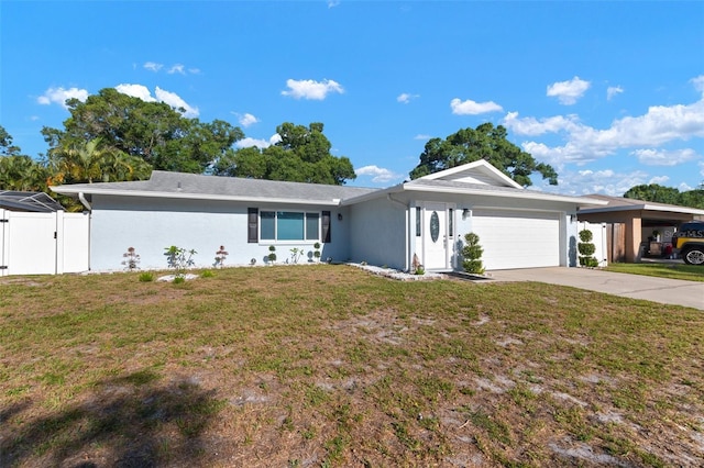 single story home featuring a front yard and a garage