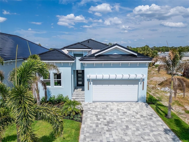 view of front of property with a garage