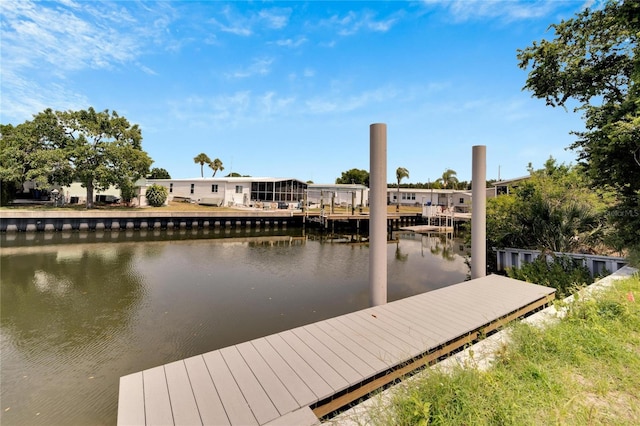 dock area featuring a water view