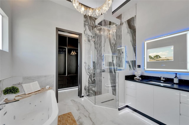 6542 Simone Shores Cir, Apollo Beach, FL 33572 - bathroom featuring a marble finish shower, a whirlpool tub, marble tiled flooring, vanity, and a chandelier
