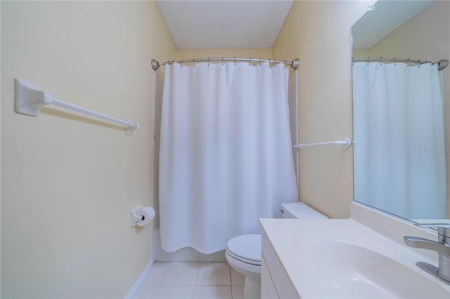 full bath with toilet, shower / bath combo with shower curtain, a textured ceiling, vanity, and tile patterned floors