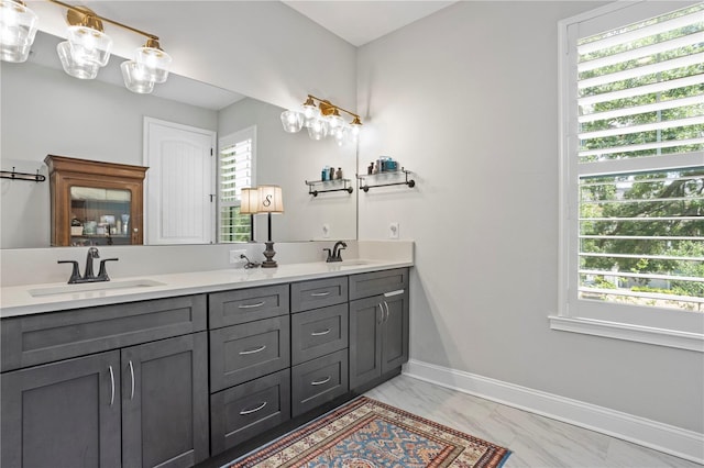 bathroom with a wealth of natural light and vanity