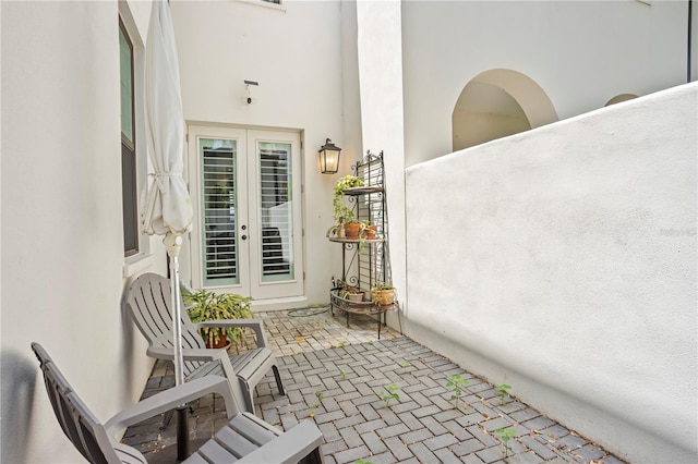 view of patio featuring french doors