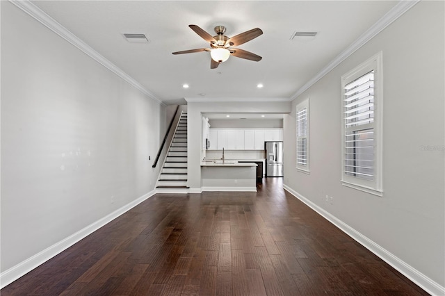 4606 W Fig St Unit 4, Tampa, FL 33609 - unfurnished living room featuring a ceiling fan, stairway, dark wood-style floors, recessed lighting, and ornamental molding