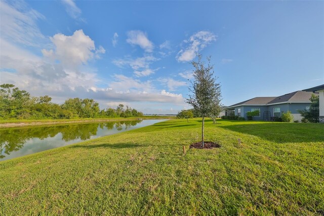 view of yard with a water view