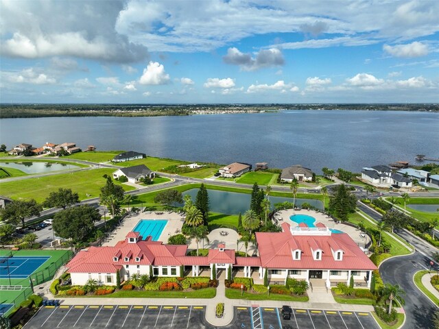 bird's eye view with a water view