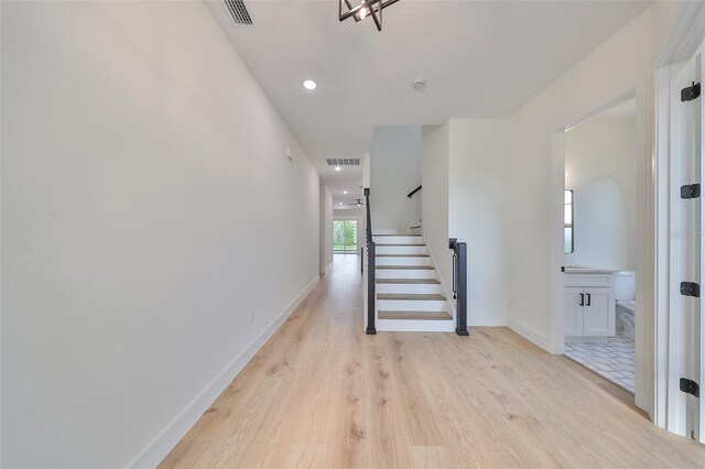 hallway featuring light hardwood / wood-style floors