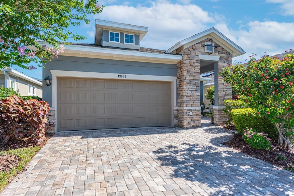 view of front of property with a garage