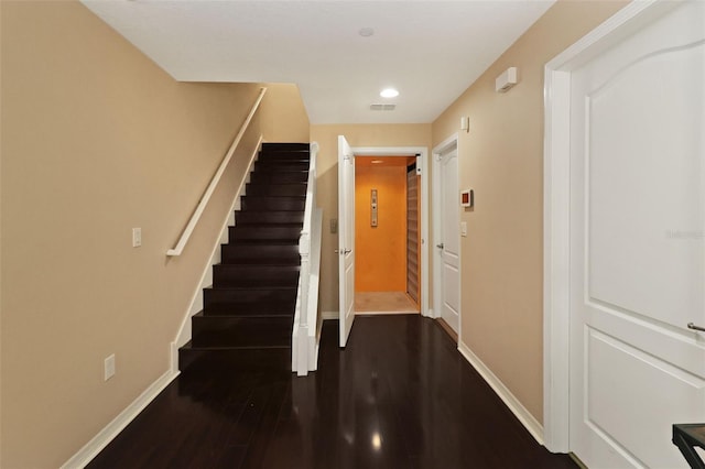 interior space with hardwood / wood-style flooring