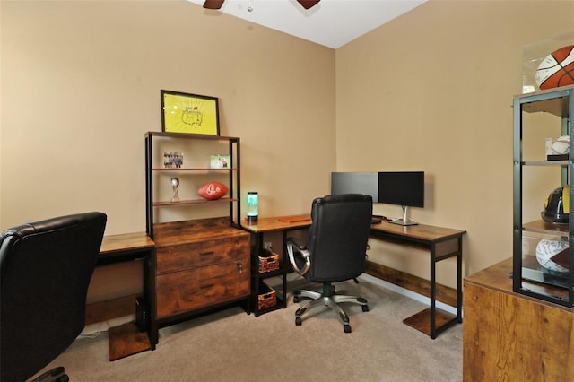 office featuring light carpet and ceiling fan