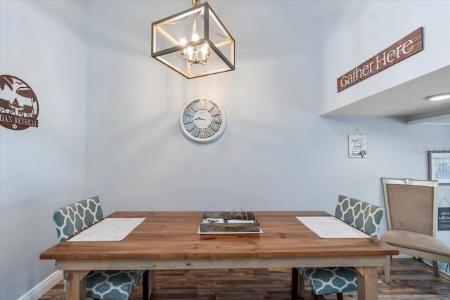 dining room featuring a notable chandelier