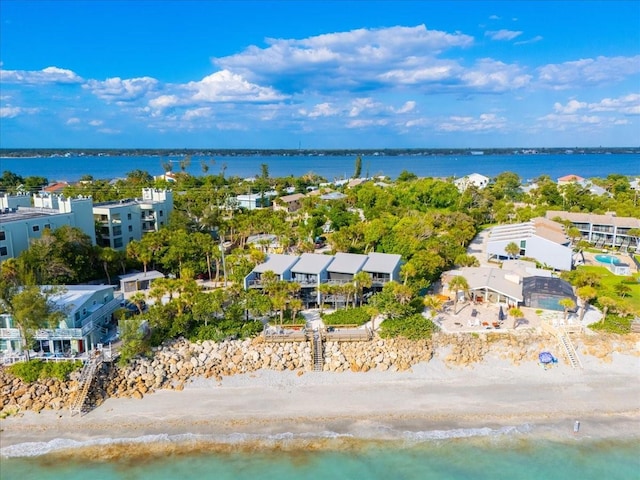 bird's eye view with a view of the beach and a water view