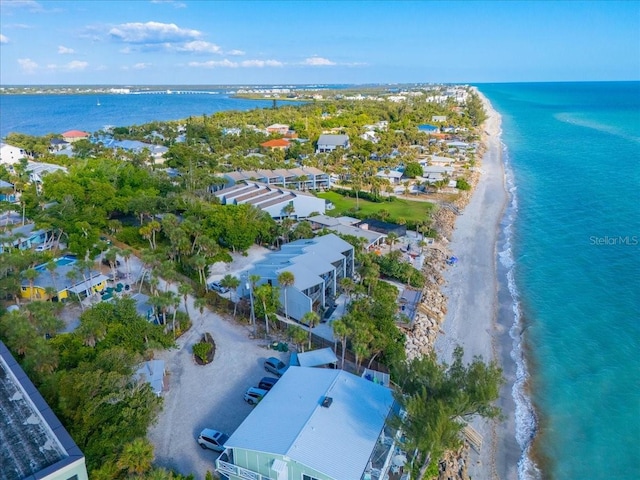 bird's eye view with a beach view and a water view