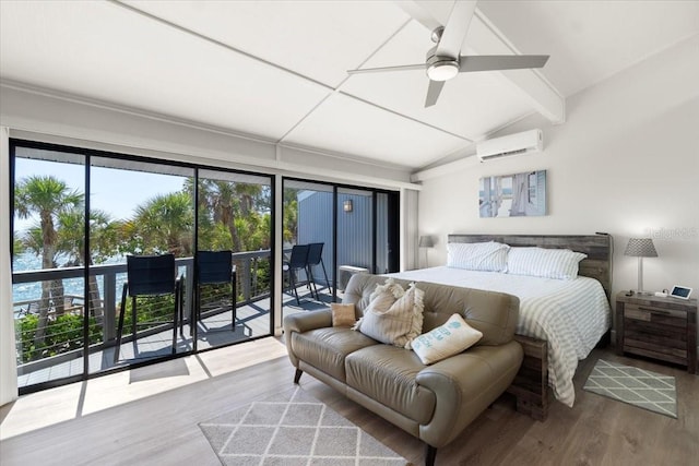 bedroom featuring vaulted ceiling, multiple windows, ceiling fan, a wall mounted air conditioner, and access to exterior