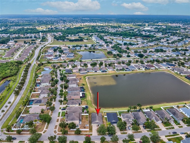 drone / aerial view featuring a water view