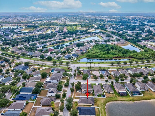 drone / aerial view with a water view