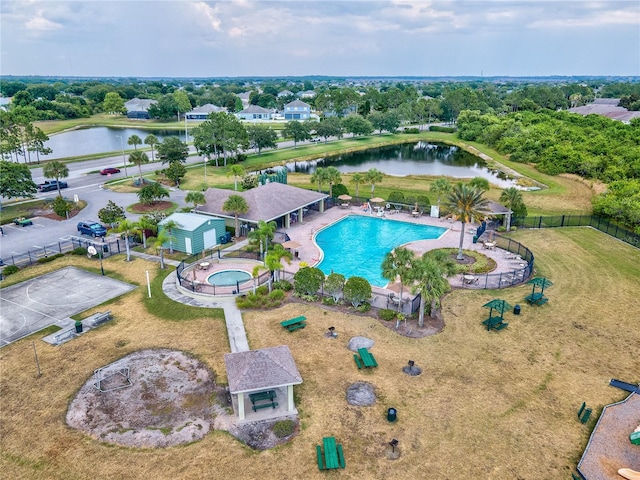 birds eye view of property featuring a water view