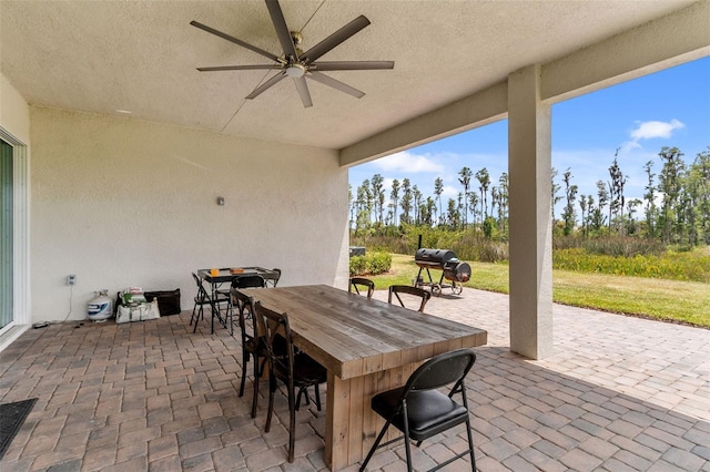 view of patio / terrace with ceiling fan