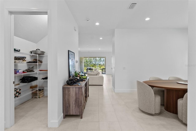 hallway with light tile patterned flooring