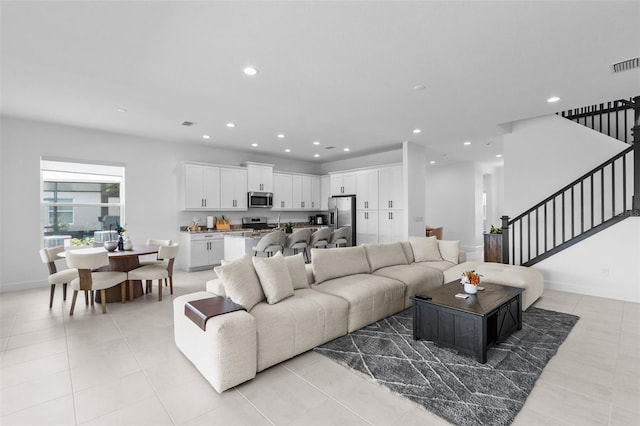 living room featuring light tile patterned floors