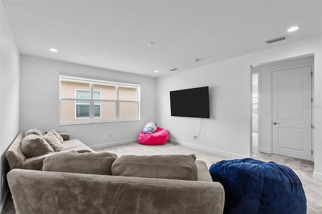 living room with light colored carpet