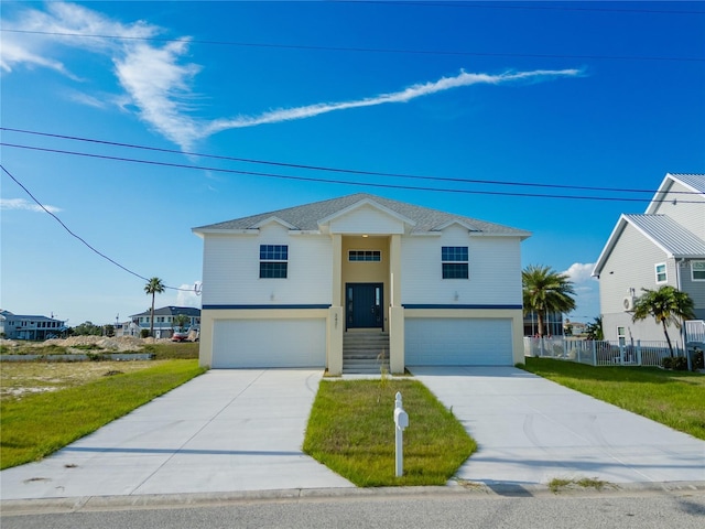 3431 Sheephead Dr, Hernando Beach, FL 34607 - view of front of home featuring an attached garage, driveway, and stucco siding