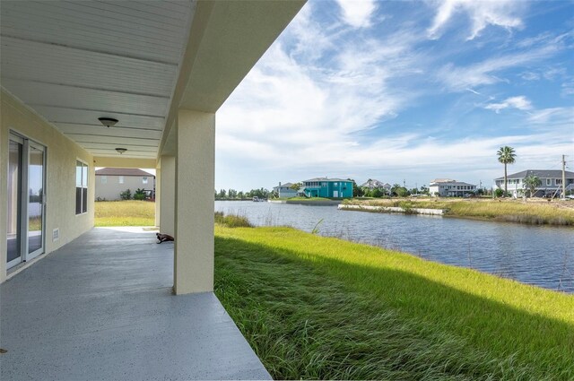 3431 Sheephead Dr, Hernando Beach, FL 34607 - view of patio / terrace with a water view