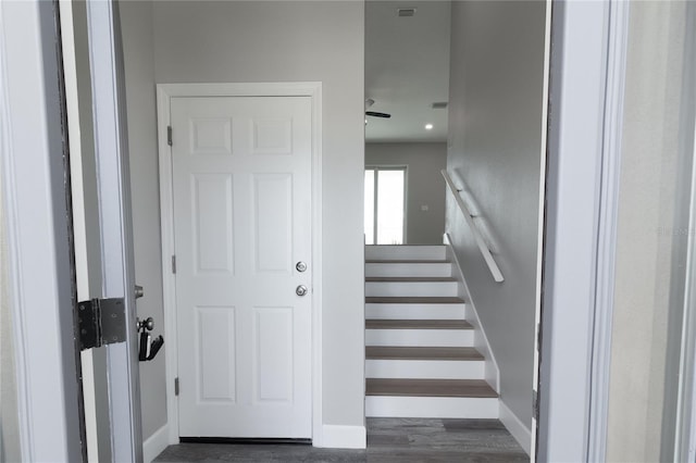 3431 Sheephead Dr, Hernando Beach, FL 34607 - stairway with wood finished floors and baseboards